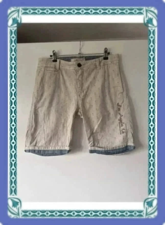 Short homme beige imprimé cocotiers